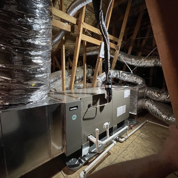 Air handler unit and ductwork system installed in residential attic