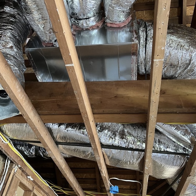 Sheet metal plenum and flex duct installation in residential attic