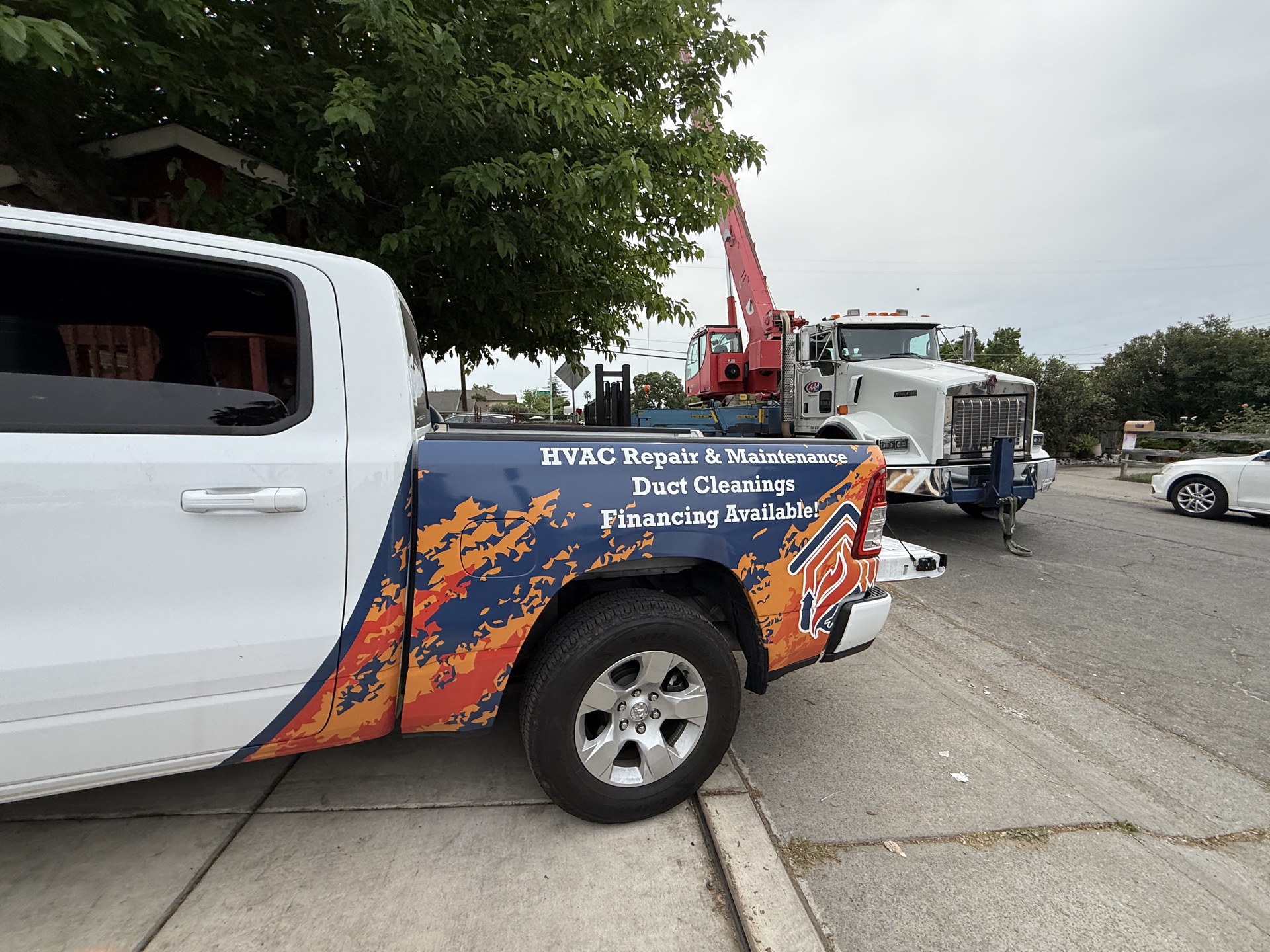 Comfortable HVAC Services truck wrap showing HVAC repair, duct cleaning, and financing services